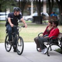 Bicycle Officer Interacting With Citizens